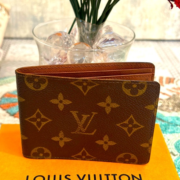 Louis Vuitton Other - SOLD OUT Louis Vuitton Monogram 10 mans wallet this is 9/10 Authentic Lv wallet.